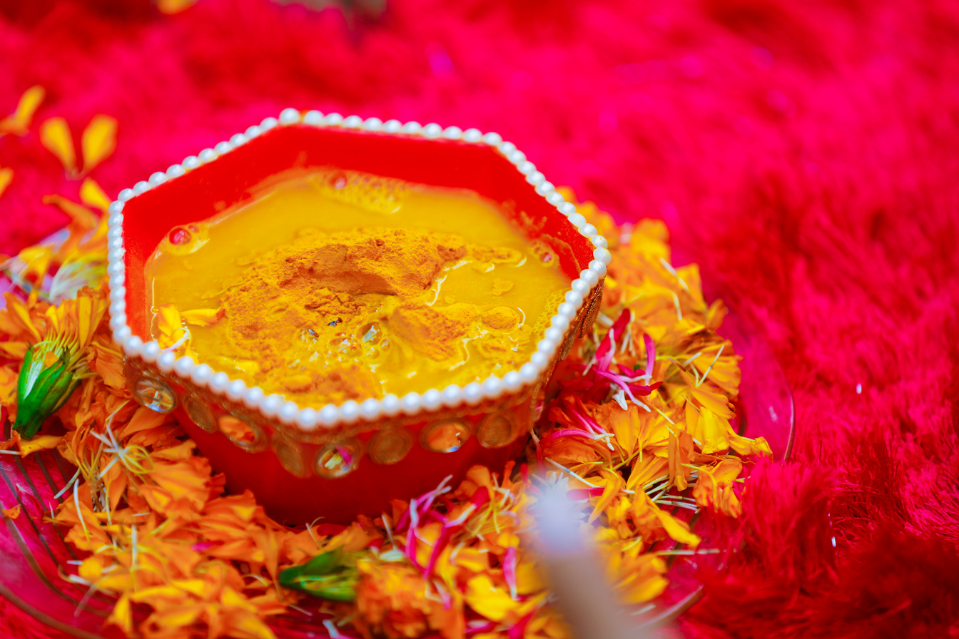 Traditional wedding ceremony in Hinduism: Turmeric in plate for haldi ceremony