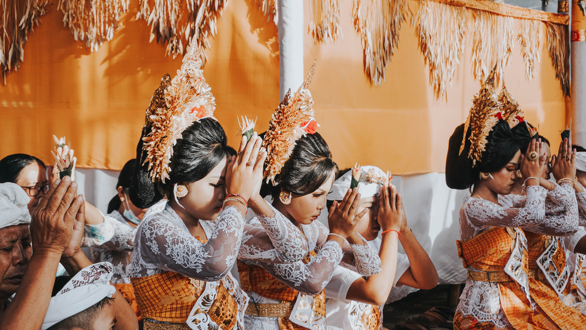 People in Traditional Wear holding a Ceremony 