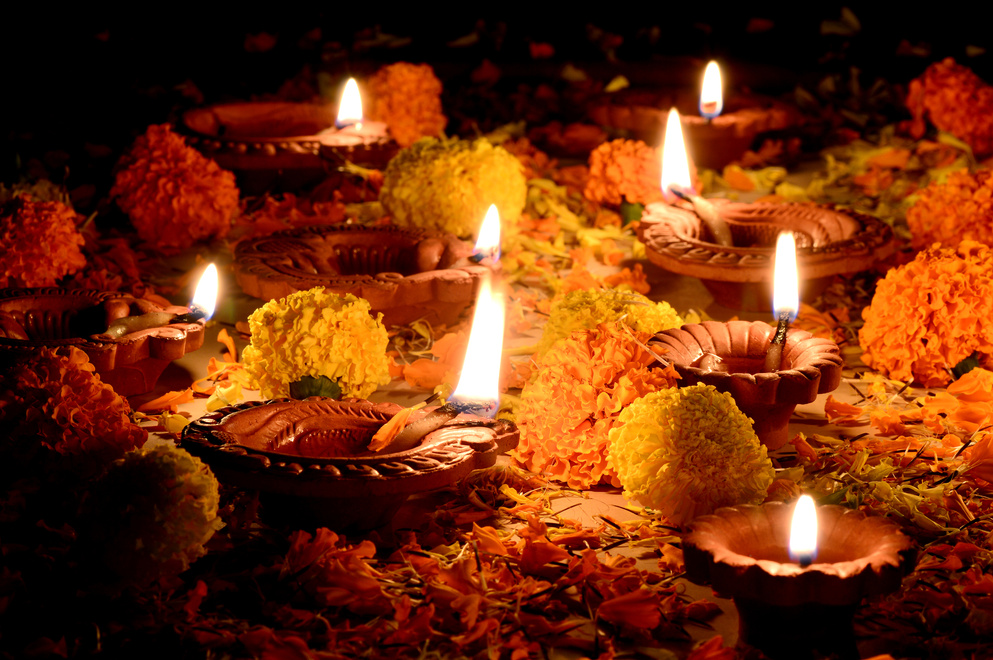 Clay diya lamps lit during Diwali Celebration. Greetings Card Design Indian Hindu Light Festival called Diwali